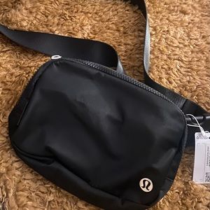 NWT: Lululemon black Everywhere Belt Bag